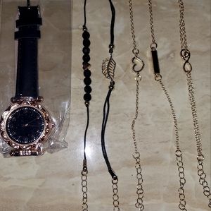 Reloj color negro con 5 cadenas mas para la mano